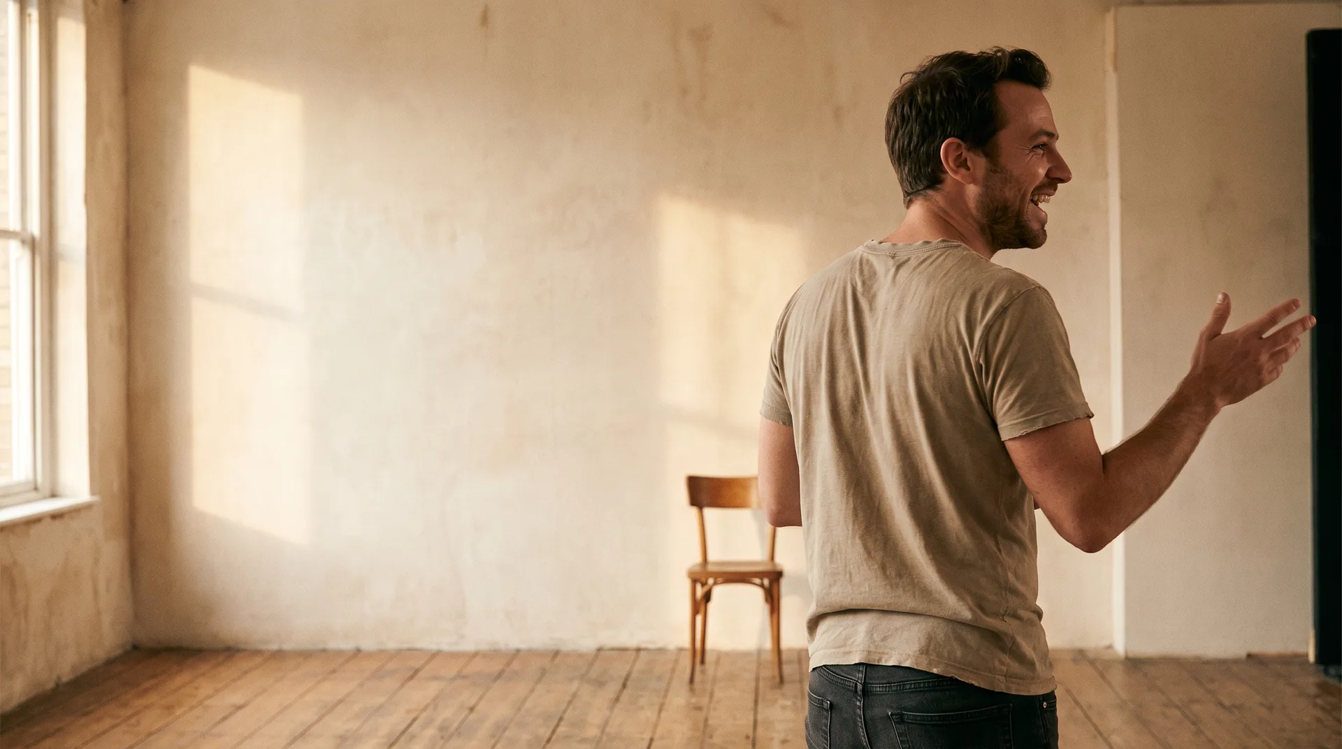 An actor alone in a rehearsal room performing a comic speech