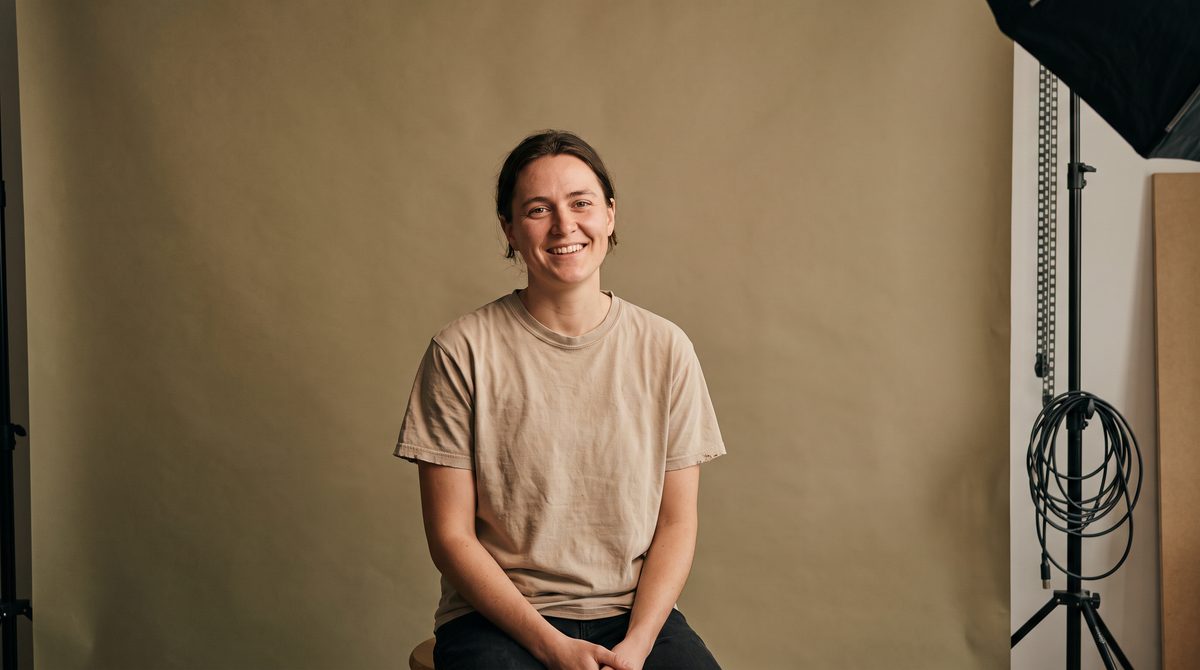 Two photographs of the same person in the same shirt, one warmer and one more settled