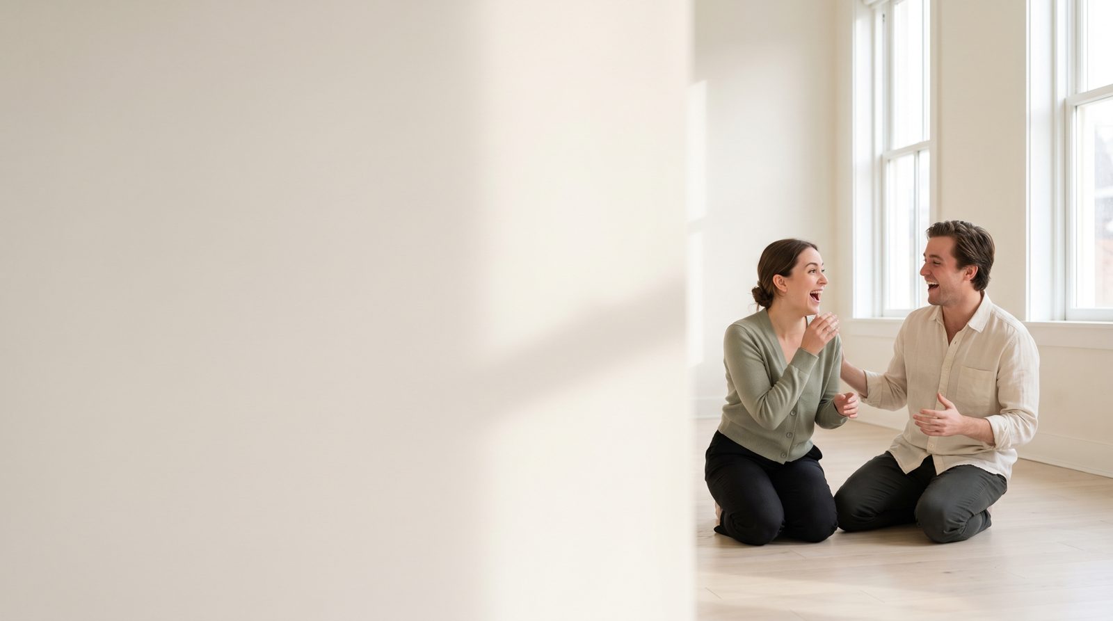 Two actors mid-improvisation in a bright studio