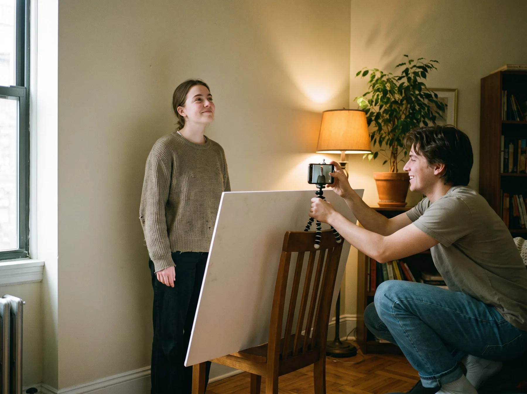 Two actors creating a thoughtful DIY headshot with a smartphone